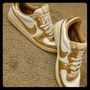 Nike gold/white cheetah design shoes